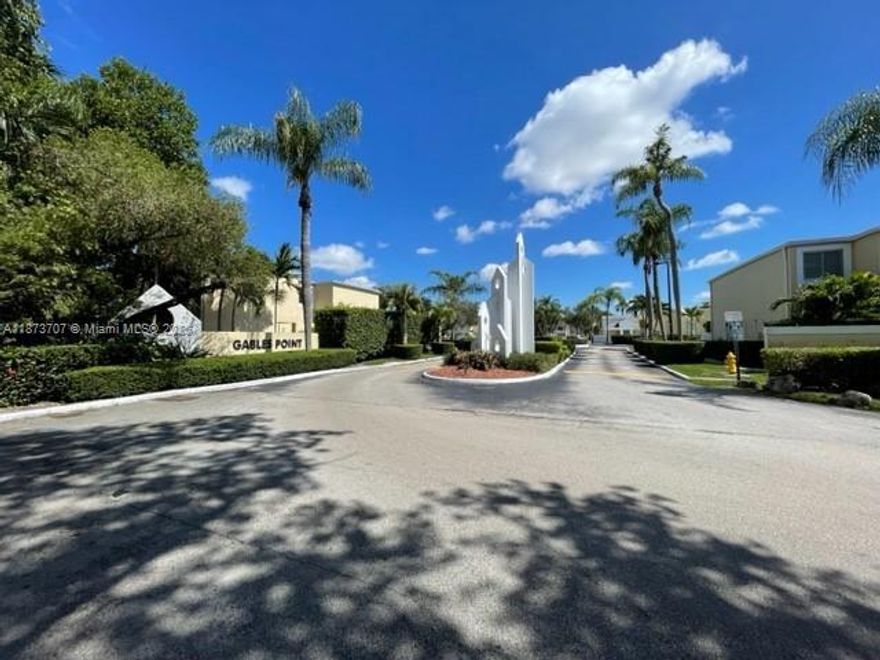 Centrally located townhouse in Gables Point, newly renovated kitchen & bathrooms & freshly painted!  2 bedroom/2.5 bathrooms with plenty of closet space, washer/dryer in unit.  Cable included.  One Assigned parking spot 183 & guest parking available.  Well maintained community pools, Raquetball, and tennis courts.  On-site guard patrol.  Quiet community is walking distance to supermarket, restaurants, & shops.