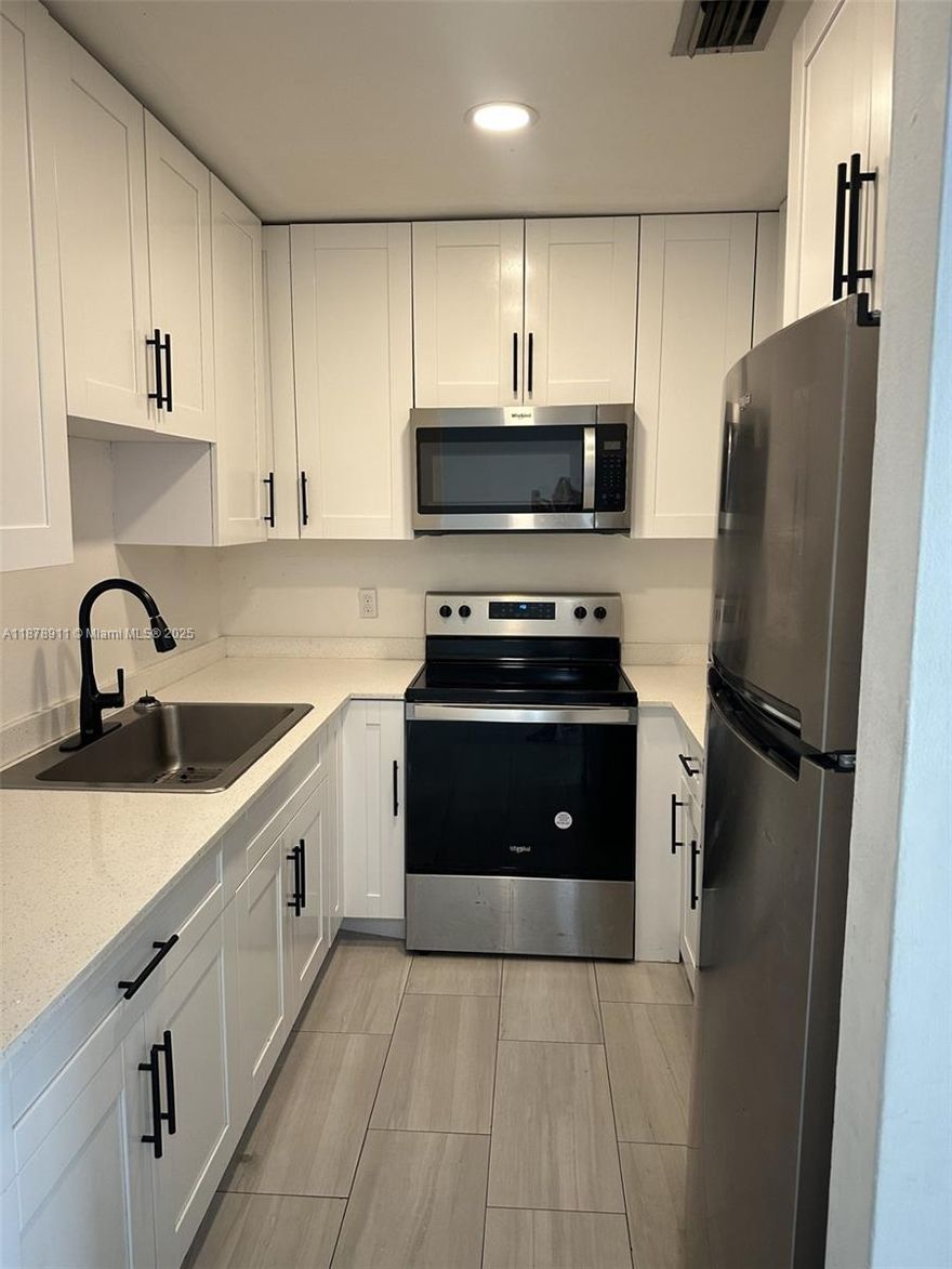 Freshly remodeled 3 bed / 2 bath in the heart of Hialeah, steps from Westland Mall and top convenances. Bright, open living/ dining flows to a modern kitchen with shaker cabinets with stainless steel appliances, remodeled bathrooms, new flooring throughout, and impact windows & impact doors for comfort and peace of mind. On-Site laundry facility with two assigned parking spaces. Fantastic location near, dining, shopping, parks, and major roads (826/Palmetto). Zoned near Meadow lane Elementary. A high demand area- Move Fast!