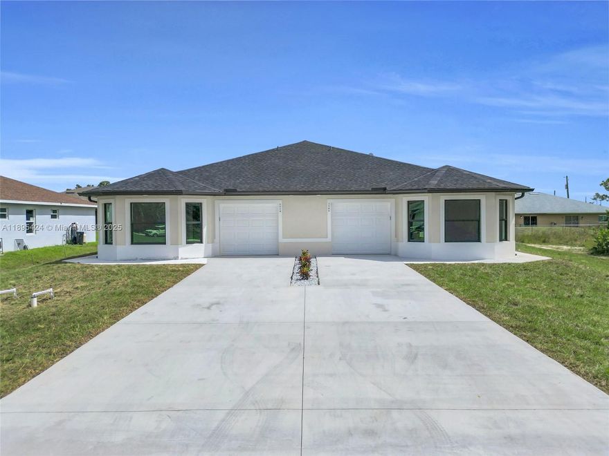 Discover this exceptional income-producing duplex, just minutes from the Buckingham Airport, 15 minutes to RSW,and 10 minutes to the Lehigh Acres Library.
This spacious 6-bedroom, 4-bath property offers incredible potential for investors or owner-occupants alike. Whether you're looking to expand your rental portfolio or live in one side and rent the other, this duplex is a fantastic opportunity in a convenient and growing are