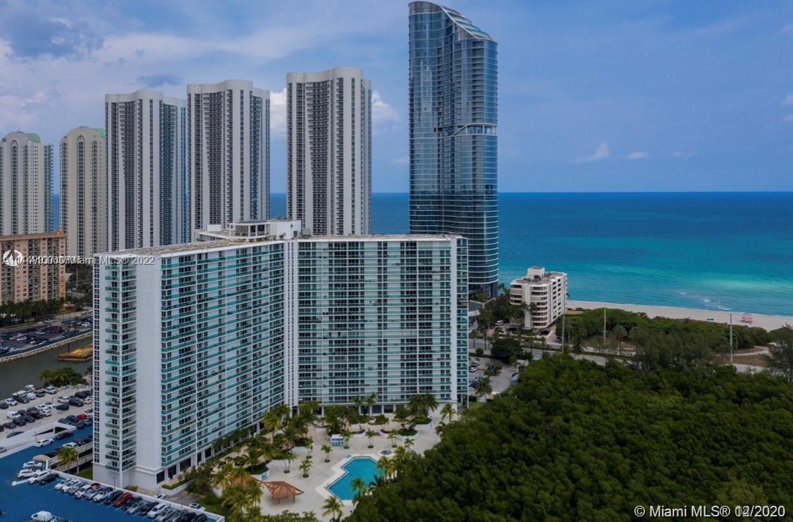 Breath taking views of the Sunset & the rising Sun, located in Sunny Isles, across Collins to Sunny Isles Beach, fully renovated apartment with taste, Spacious with 1/2 bath for guest, features the Open Kitchen with eat-in Island, plenty of cabinets, Porcelanite floors throughout, panoramic, High Impact, Floor to Ceiling, sliding doors windows given access to a large balcony with gorgeous views. Building amenities, GYM, Swimming Pool, onsite Cafeteria, Laundry room, Front Desk, Valet, 24 hours Security Guard Entrance, won't last! Easy to show!