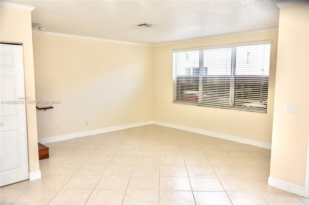 Photo of 10560 NW 57th Ct, Coral Springs, FL 33076 (MLS # A12028372)