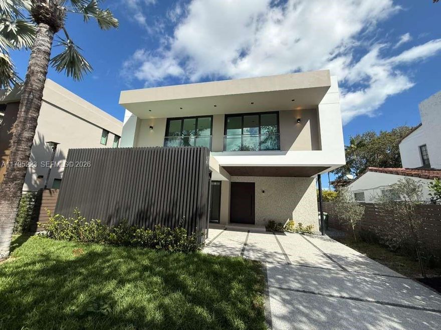 New construction in The Roads near Brickell. This 5 bed, 6.5 bath single-family home features 4,308 SF under A/C (5,259 total SF), plus a maid's/in-law suite. Designed for luxury living with Italian custom kitchen, gym, sauna, and open-concept interiors. Outdoor space includes pool, jacuzzi, summer kitchen with BBQ, full cabana bath, and lush garden with a beautiful mango tree. A perfect blend of comfort and elegance in one of Miami's most desirable neighborhoods.