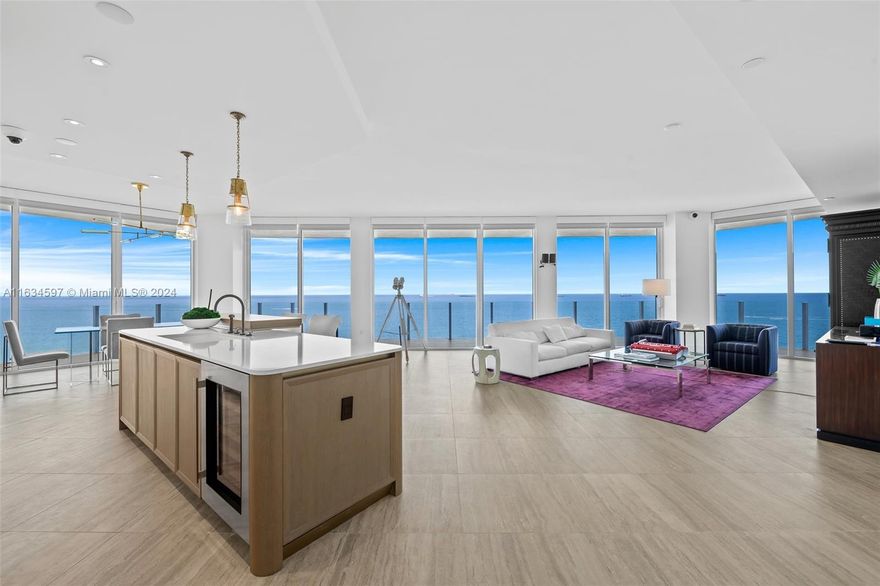 This unique unit offers an unparalleled experience, floating above the ocean with unobstructed, direct views of Fort Lauderdale Beach. Featuring 2 bedrooms and 2.5 bathrooms, you'll be greeted by breathtaking ocean views as soon as you enter. Every room boasts dramatic floor-to-ceiling glass windows, while the open kitchen and living space provide stunning 180-degree ocean views. Explore the wraparound terrace stretching the entire width of this residence, accessing all rooms and living spaces. The kitchen is equipped with custom cabinetry and top-of-the-line appliances, while the double master layout ensures optimal privacy for you and your guests with custom LED-lit closets and elegantly designed marble bathrooms.