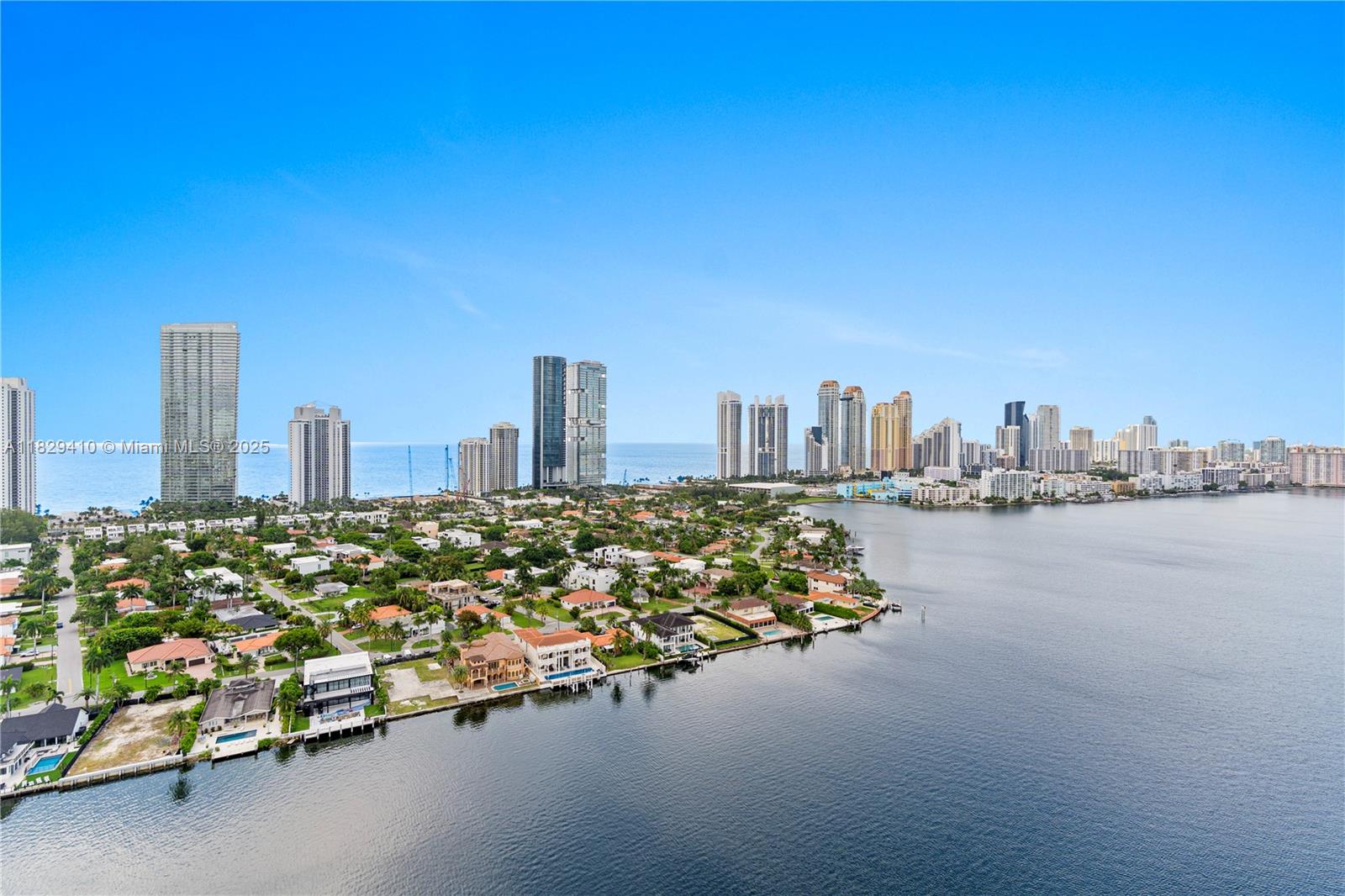 Experience elevated coastal living in this rare penthouse condo with panoramic water views from every room. Enjoy ocean breezes from the wraparound balcony and soaring ceilings that fill the space with natural light. Features 3 spacious bedrooms—2 with ensuite baths—plus a semi-open kitchen, full laundry room, hurricane shutters, and a 2-year-old A/C. This is the best line in the building—truly one-of-a-kind. Five-star amenities: waterfront pool, gym, tennis, pickleball, restaurant, coffee shop, dog park, electric car stations, lush gardens, and marina. Minutes from Aventura Mall, beaches, and houses of worship. A slice of paradise awaits.
