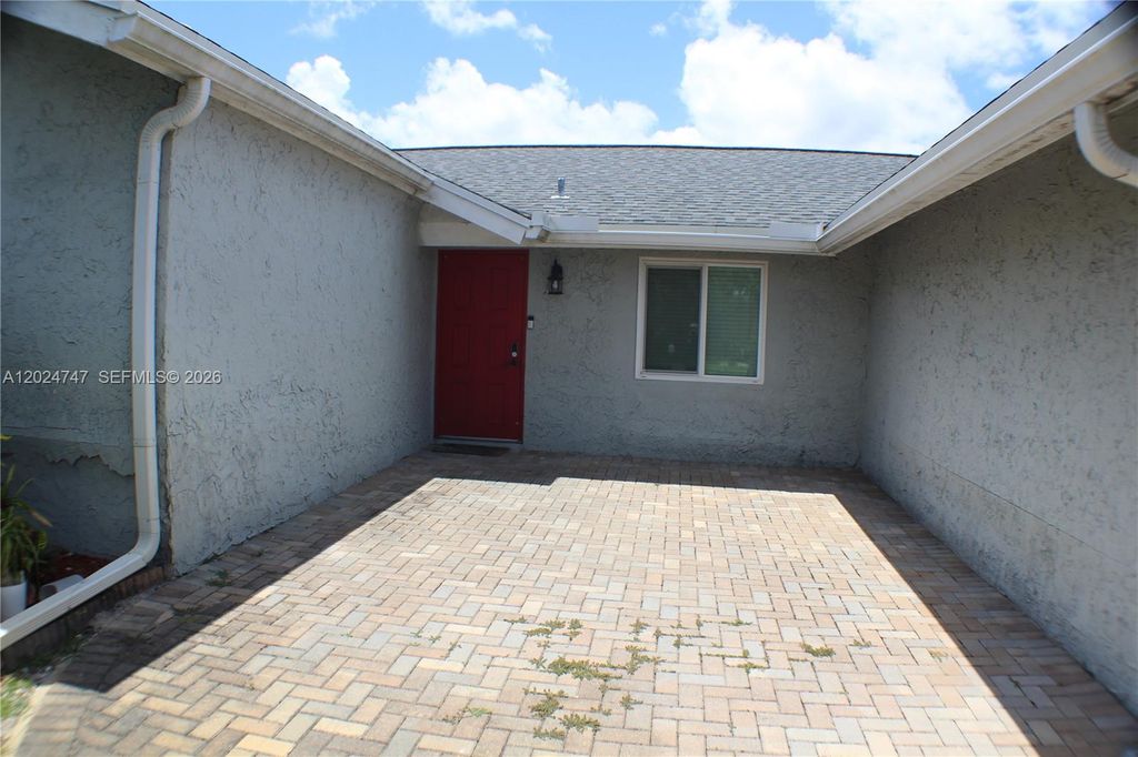 Photo of 1317 SW 82nd Ave, North Lauderdale, FL 33068 (MLS # A12024747)
