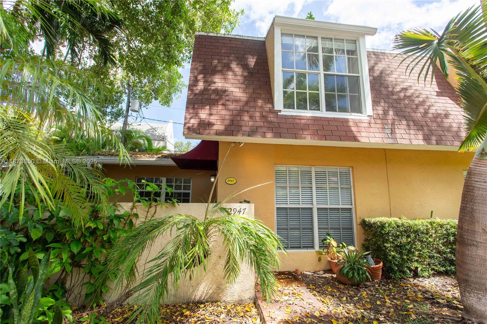 Secluded, gated, private townhouse community. Perfect Center Grove location, walking distance to restaurants, and shops. This 2-bedroom, 2- bath unit comes with 2 gated assigned parking spaces. Charming front and rear patios. Townhouse has a nice galley kitchen with stainless steel appliances. Tile and wood floors, washer and dryer on premises. Bedrooms are on separate floors, larger bedroom is on the 2nd floor. Water is included in rent.