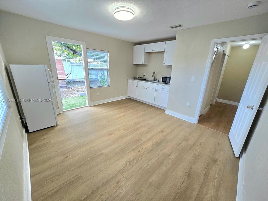 Rent this nicely upgraded studio in the heart of North Miami. One block from Biscayne Boulevard and 135th St with shopping plazas withing a couple of blocks away. The studio has a kitchen with a double portable burner, a microwave, and a refrigerator as well as plenty of kitchen cabinets, a large bathroom, and a small patio. Independent entrance (see pictures). The studio has been freshly painted, laminated floors recently upgraded, lots of light through both windows, and a small patio for your moments of relaxation. Utilities included with the rental price. Cant beat this opportunity. Maximum occupancy two people, ideally one. Contact us with any questions or to see the studio.