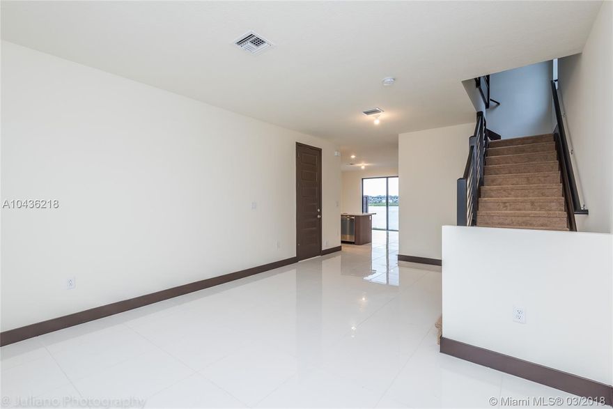 BEAUTIFUL BRAN NEW TOWNHOUSE IN A PREMIER GATED WATERSIDE COMMUNITY. MOONSTONE MODEL. IT HAS 3 BEDROOMS AND 3 FULL BATHS. CERAMIC TITLE ON THE FIRST FLOOR AND CARPET ON THE SECOND FLOOR. SS APPLIANCES. QUARTZ COUNTERTOPS. AMAZING LAKE VIEW UNIT. READY TO MOVE IN!! A MUST SEE!!