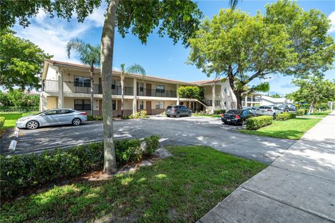 Photo of 8705 NW 38th Dr #3A, Coral Springs, FL 33065 (MLS # A12016454)
