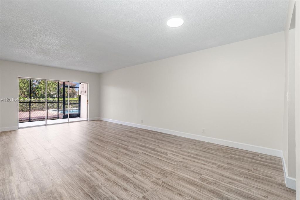 Photo of 8705 NW 38th Dr #3A, Coral Springs, FL 33065 (MLS # A12016454)