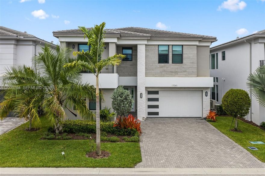 Coming Soon! Experience elevated luxury living in the highly sought after Lotus community in Boca Raton. This stunning Polynesia model offers 5 bedrooms, 7 bathrooms, and an exceptional open floor plan designed for both comfort and sophistication. Soaring volume ceilings and sleek glass railings create a bright, modern ambiance throughout, while the expansive living areas flow seamlessly into a chef inspired kitchen perfect for entertaining.

Upstairs, a spacious loft provides a versatile living area ideal for a media room, office, or lounge. The primary suite is a true retreat, featuring oversized walk in closets and separate his and her bathrooms for ultimate privacy and comfort. The secondary bedrooms are generously sized, with most offering en suite baths, while one bedroom is conveniently serviced by a full bathroom just outside perfect for guests or flexible use.

Step outside to a beautifully designed backyard with a cabana bath, ideal for future pool and outdoor living plans. Located in one of Boca Raton’s premier gated communities, Lotus offers world class amenities including a resort style clubhouse, fitness center, pools, tennis, pickleball and more.

A perfect blend of luxury, space, and modern design this home is a must see. Stay tuned for more details!