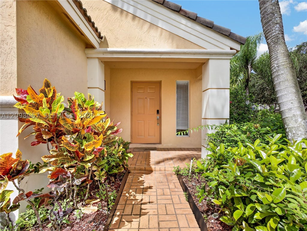Photo of 1509 Sunset Way, Weston, FL 33327 (MLS # A12098067)