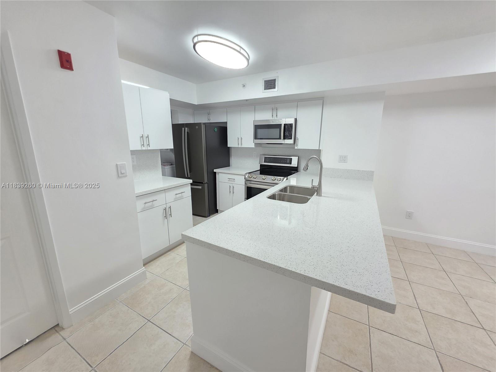 >>>Beautifully remodeled 2-bed, 2-bath split floor plan apartment! This move-in ready apartment features a spacious layout with new cabinetry and quartz countertops in the kitchen and bathrooms. Impact windows in all bedrooms and sliding doors offer safety and style. Includes stainless steel appliances and thoughtful upgrades throughout. Ideally located near NSU, colleges, schools, HCA Florida University Hospital, major malls, and shopping centers with quick access to 595, I-75, I-95, and the FL Turnpike. Enjoy luxurious amenities: pool, cabana, billiard room, basketball, and tennis courts. Owner will pay all special assessments at closing. THE ASSOCIATION IS ACTIVELY WORKING ON THE IMPROVEMENTS OUTLINED IN THE SPECIAL 4 ASSESSMENTS, WHICH THE OWNER WILL PAY IN FULL AT CLOSING.<<<
