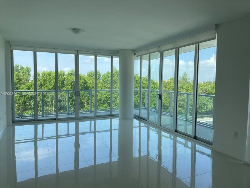 HOT NEW LISTING: Rare opportunity to own the largest 3-bedroom + DEN layout in Doral. This expansive residence offers 3 full baths + powder room and 1,906 SQ FT under AC, with a versatile DEN easily convertible into a 4th bedroom. Designed for modern living, it features an open gourmet kitchen with Italian cabinetry, Bosch stainless steel appliances, smart home technology, and an oversized quartz island perfect for entertaining. Bright, open living and dining areas flow through telescopic impact glass doors into a huge wraparound balcony.

Premium finishes include porcelain floors, roller blinds, sleek bathrooms with frameless glass showers, upgraded washer/dryer, and generous closet space. Enjoy 2 assigned covered parking spaces, plus guest parking, and a large private storage cage conveniently located just steps from your door. Prime location near top schools, shopping, dining, and major highways. Tenant-occupied—advance notice required.