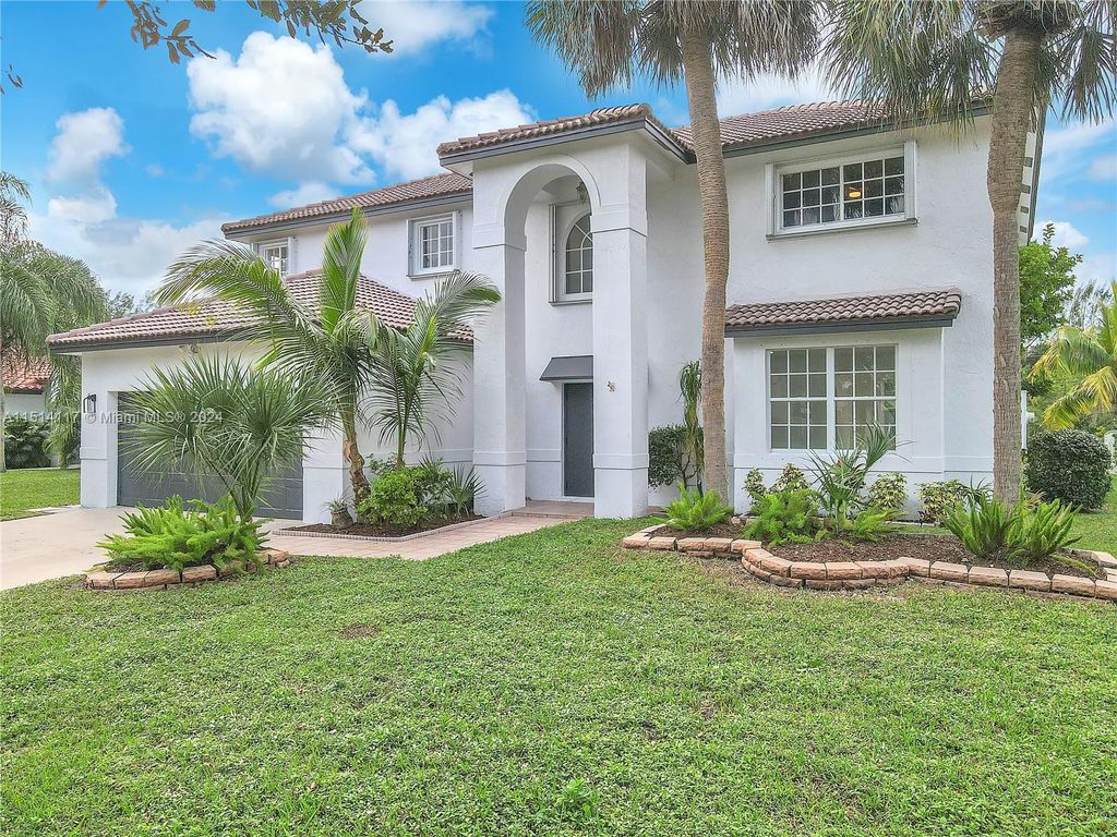 Photo of 7543 NW 47th Ter, Coconut Creek, FL 33073 (MLS # A11514117)