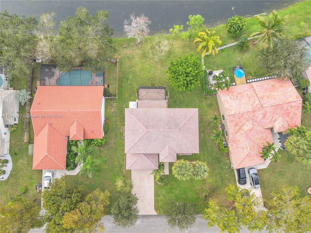 Photo of 7543 NW 47th Ter, Coconut Creek, FL 33073 (MLS # A11514117)