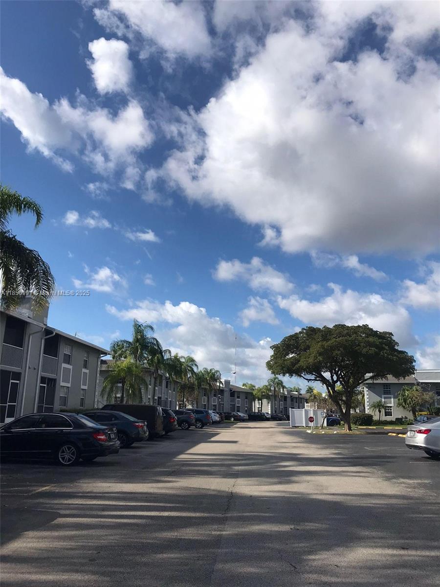 very nice 2 /2 apartment, first floor entry, washer and dryer inside unit, huge flor plan, gated community, beautiful pool area