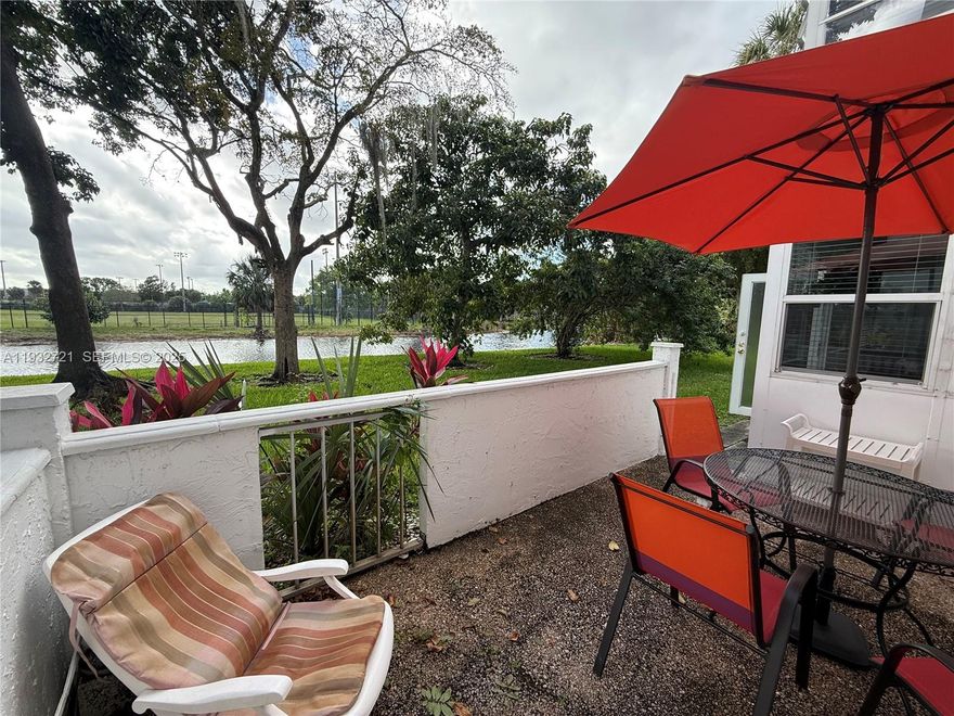 FURNISHED 2 BEDS/ 2 BATHS condo located in a 55+ community! This unit is located on the first floor and has access to a beautiful back patio/courtyard overlooking the peaceful water. CORNER unit and kitchen is equipped with a dishwasher. No carpet found throughout the unit and the bedrooms are well divided. Florida room is enclosed with hurricane impact windows. Spacious living area and primary bedroom has a big walk-in closet. Extra storage is located on the third floor and laundry is on the same floor as the condo. Parking spot is #20. Many amenities such as clubhouse, pool, gym, tennis etc! Water heater is ABOUT 4 YEARS OLD.