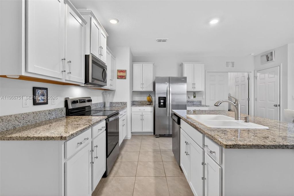 Photo of 12301 SW Rimini Way, Port St Lucie, FL 34987 (MLS # A11966751)