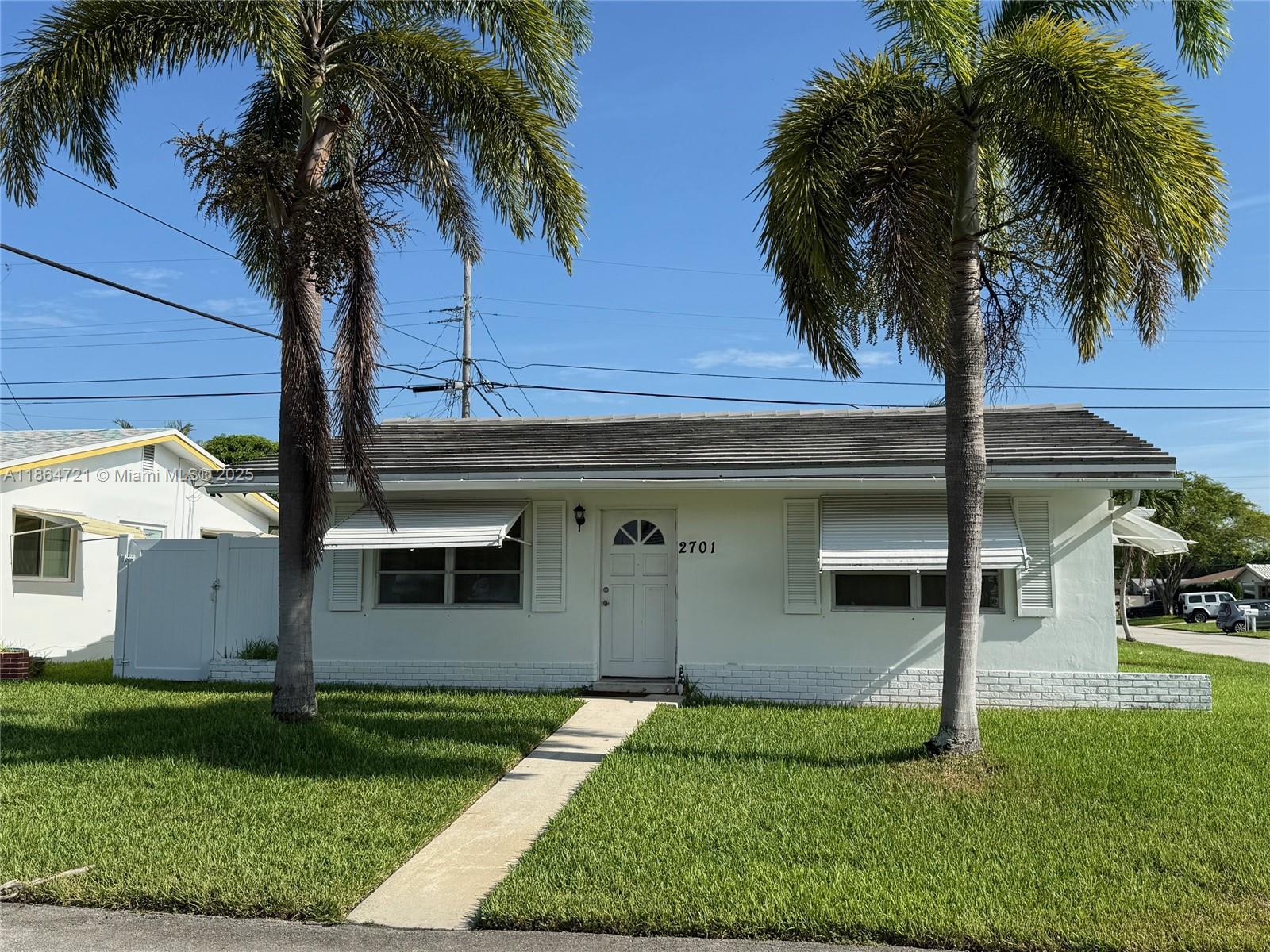 Discover this delightful 2-bedroom,1-bath single-family home tucked away in the peaceful Tamarac Lakes North community. This charming one-story residence is a true "diamond in the rough," offering waterproof laminate flooring, full-size appliances, central A/C, and a fenced yard & a carport. Inside, you'll find an inviting open kitchen seamlessly connecting the main living area to the dining and family rooms, plus a convenient laundry room with full-size washer and dryer. The community enhances your lifestyle with amenities such as a clubhouse, pool, and lawn and sprinkler services. Ideally located just minutes from the beaches, Uptown Fort Lauderdale, Tri-Rail, shopping, and the airport this property makes an ideal starter home or investment opportunity. Don't miss this rare find!