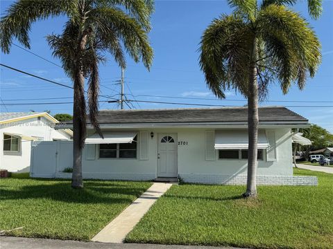 Photo of 2701 NW 52nd Ct, Tamarac, FL 33309 (MLS # A11864721)