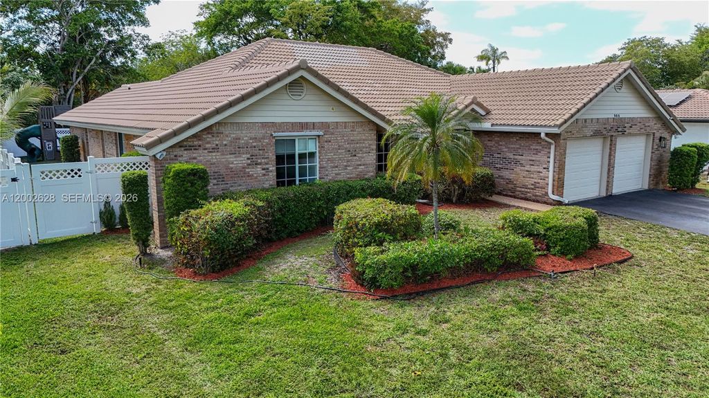 Photo of 966 NW 114th Ave, Coral Springs, FL 33071 (MLS # A12002628)