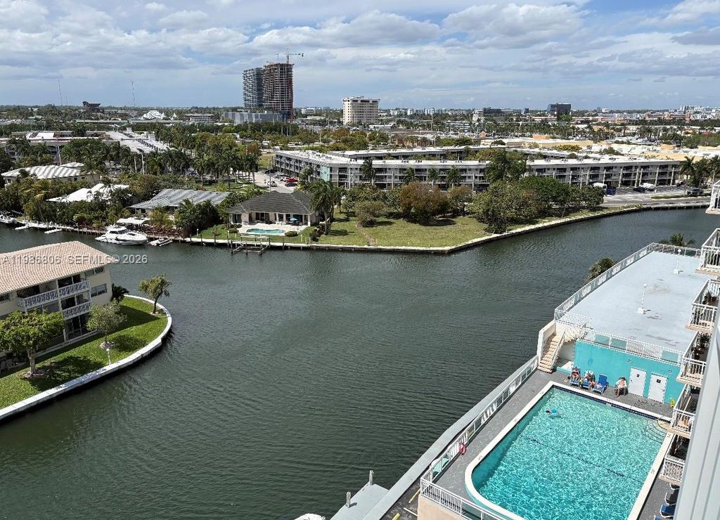 Photo of 427 Golden Isles Dr #10D, Hallandale Beach, FL 33009 (MLS # A11986806)