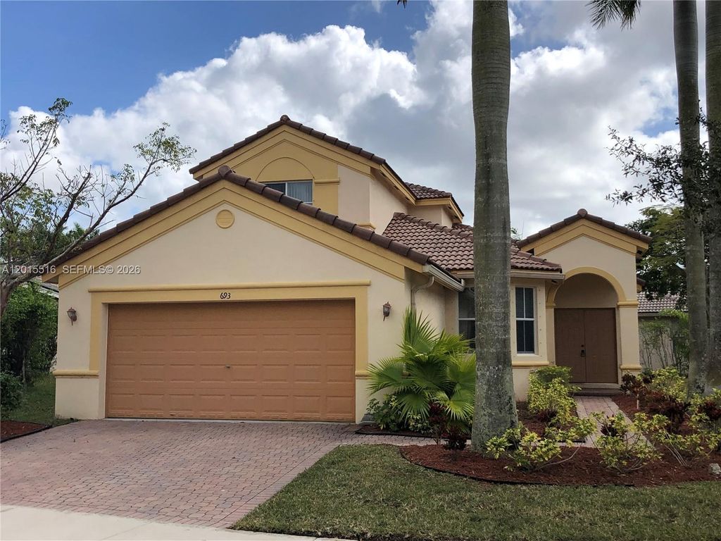 Photo of 693 Live Oak Ln, Weston, FL 33327 (MLS # A12015516)