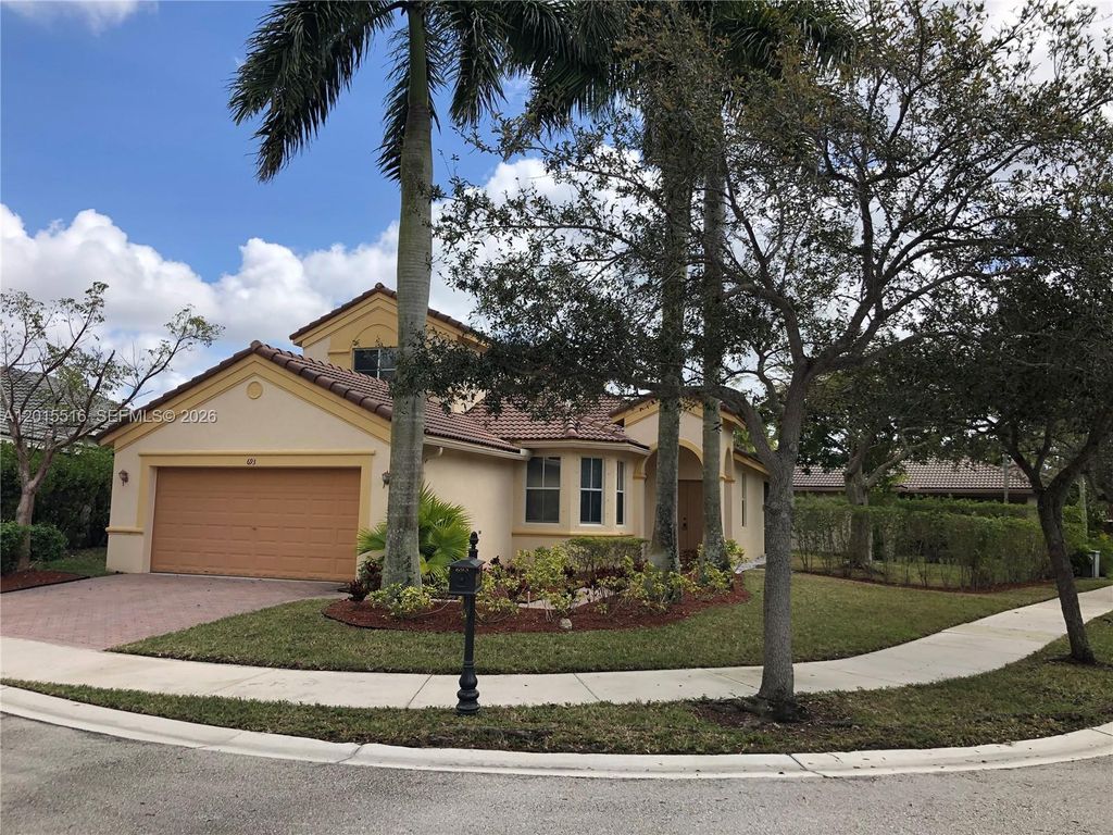Photo of 693 Live Oak Ln, Weston, FL 33327 (MLS # A12015516)