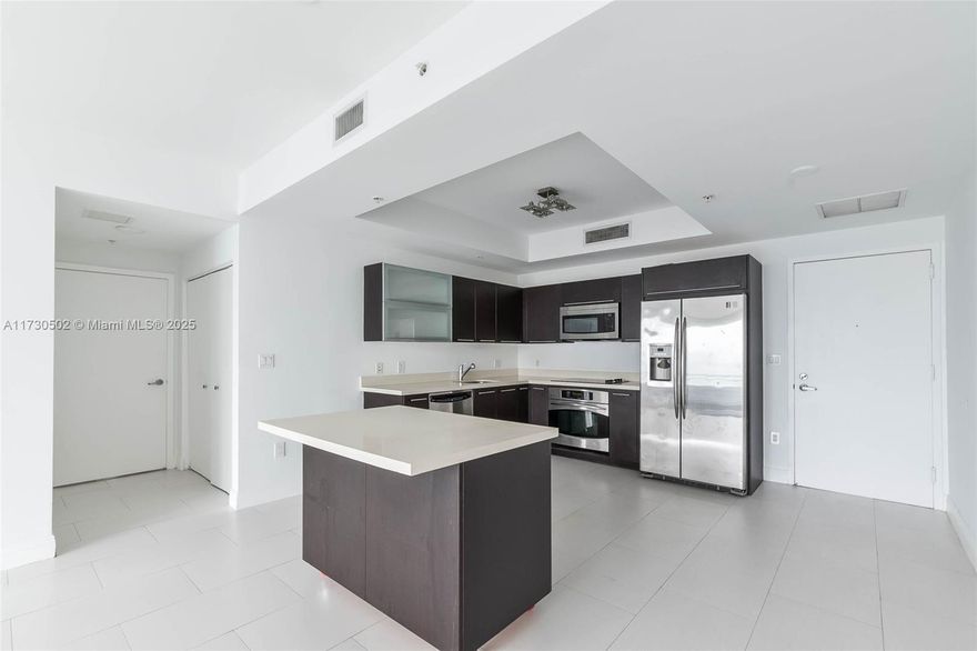 Beautiful 2/2 Condo with stunning views. Exclusive amenities include in house-spa with a concierge, gym, pool, steam room, sauna, playroom, and terraces with city view. Unit faces the Miami River and features huge closets including a private walking closet and two full bathrooms. Only gated community in this part of Brickell with double security at main gate and at the building.