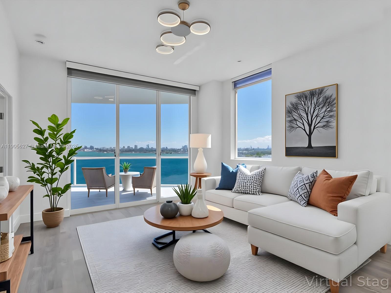 This waterfront unit is a beautifully updated 2-bedroom plus 1 den, 2-bath corner unit. Flooded with sunlight from, this home offers a bright, open layout with high ceilings and a sleek design. The property has been recently renovated, featuring quartz countertops and stainless steel appliances. Both bathrooms have been stylishly redesigned with contemporary finishes. Enjoy 3 private balconies showcasing panoramic views of the bay and Miami’s skyline. Residents enjoy resort-style amenities, 2 parking spots, including a waterfront pool, fitness center, and social lounge. Perfectly located in a quiet boutique building near top restaurants, shops, and the beach—this is Miami living at its best.