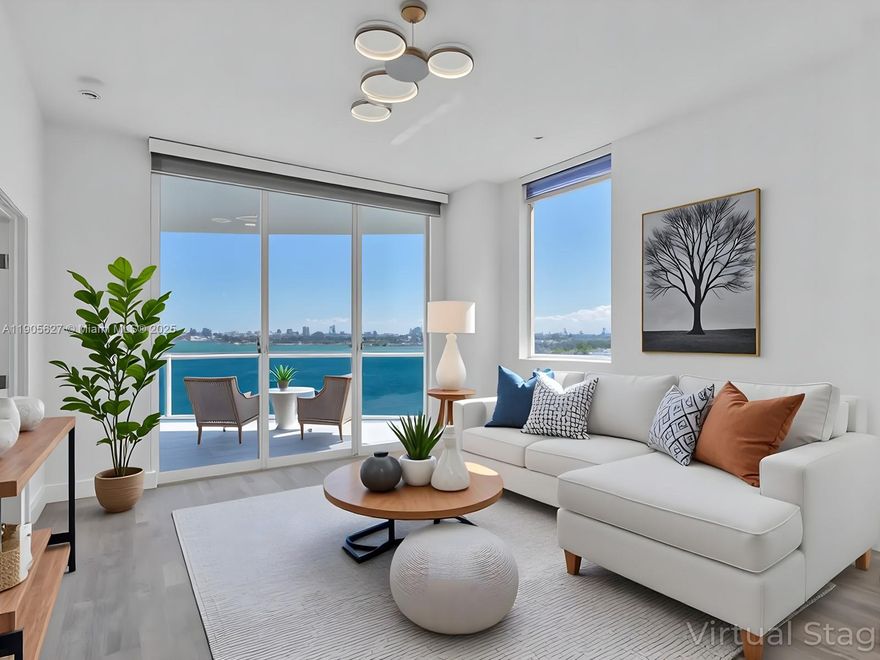 This waterfront unit is a beautifully updated 2-bedroom plus 1 den, 2-bath corner unit. Flooded with sunlight from, this home offers a bright, open layout with high ceilings and a sleek design. The property has been recently renovated, featuring quartz countertops and stainless steel appliances. Both bathrooms have been stylishly redesigned with contemporary finishes. Enjoy 3 private balconies showcasing panoramic views of the bay and Miami’s skyline. Residents enjoy resort-style amenities, 2 parking spots, including a waterfront pool, fitness center, and social lounge. Perfectly located in a quiet boutique building near top restaurants, shops, and the beach—this is Miami living at its best.