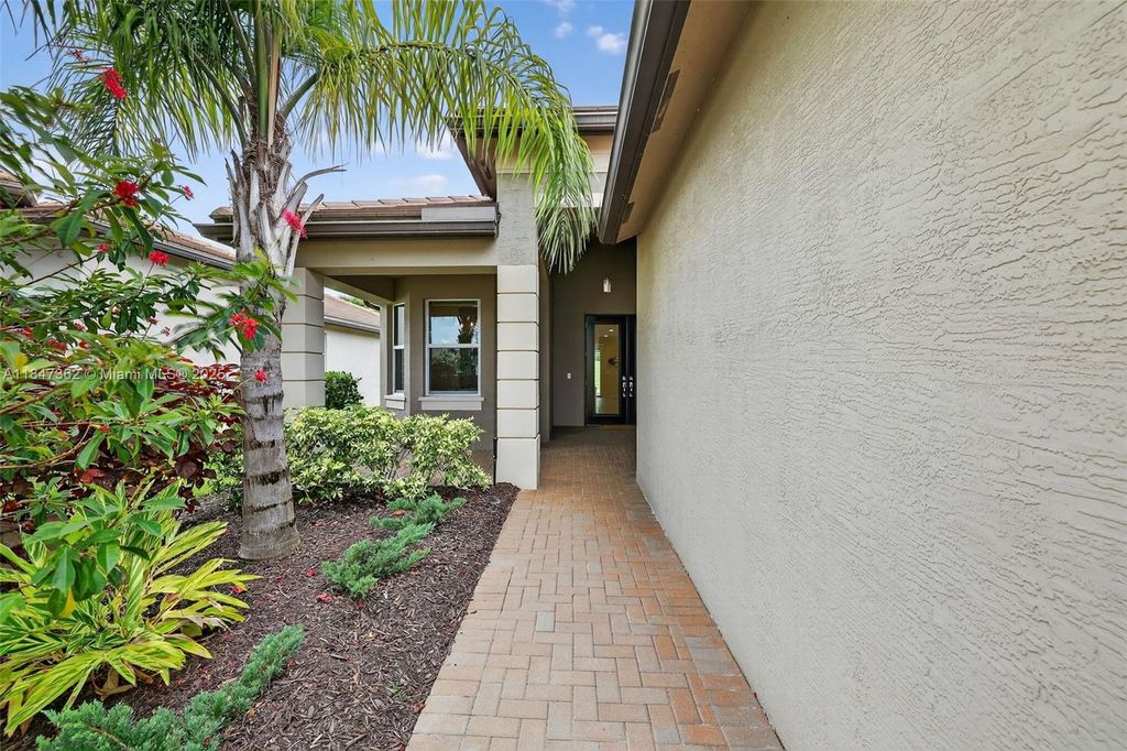 Photo of 10649 SW Sunray St, Port St Lucie, FL 34987 (MLS # A11847362)