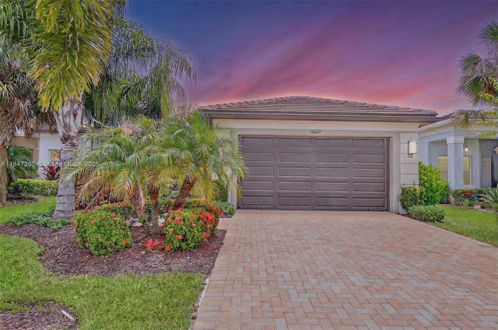 Photo of 10649 SW Sunray St, Port St Lucie, FL 34987 (MLS # A11847362)