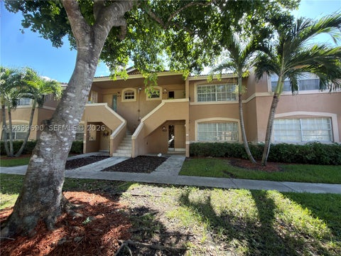 Photo of 11448 NW 43rd St #11448, Coral Springs, FL 33065 (MLS # A12099690)