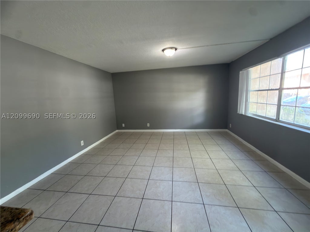 Photo of 11448 NW 43rd St #11448, Coral Springs, FL 33065 (MLS # A12099690)