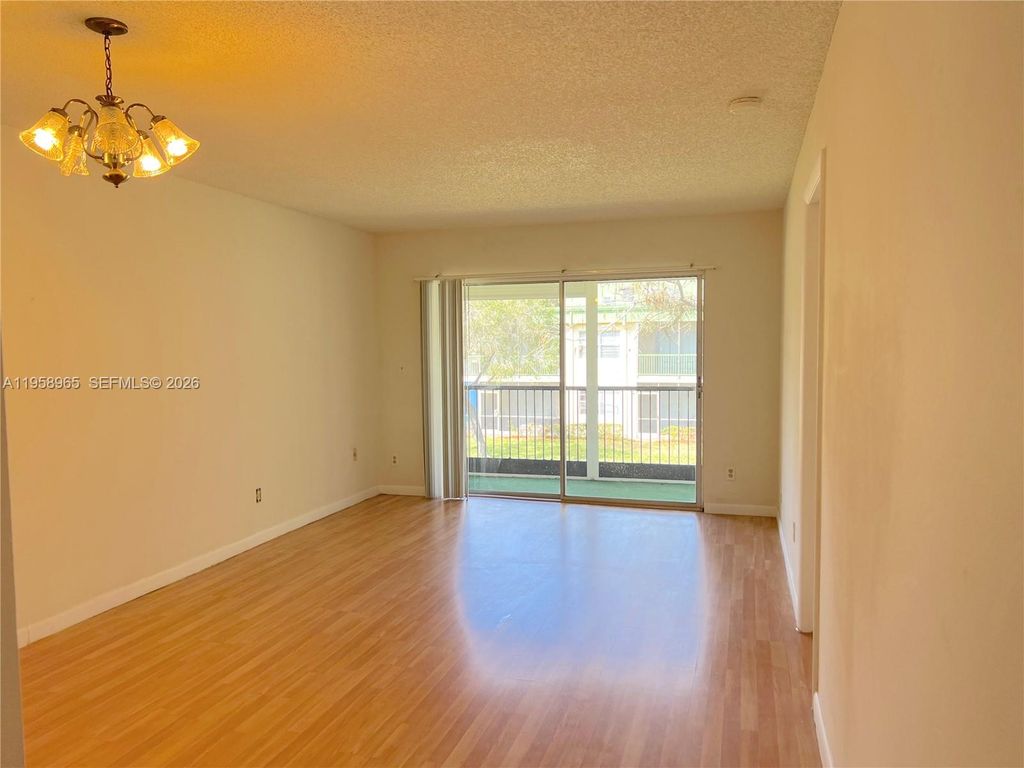 Photo of 4271 NW 89th Ave #205, Coral Springs, FL 33065 (MLS # A11958965)