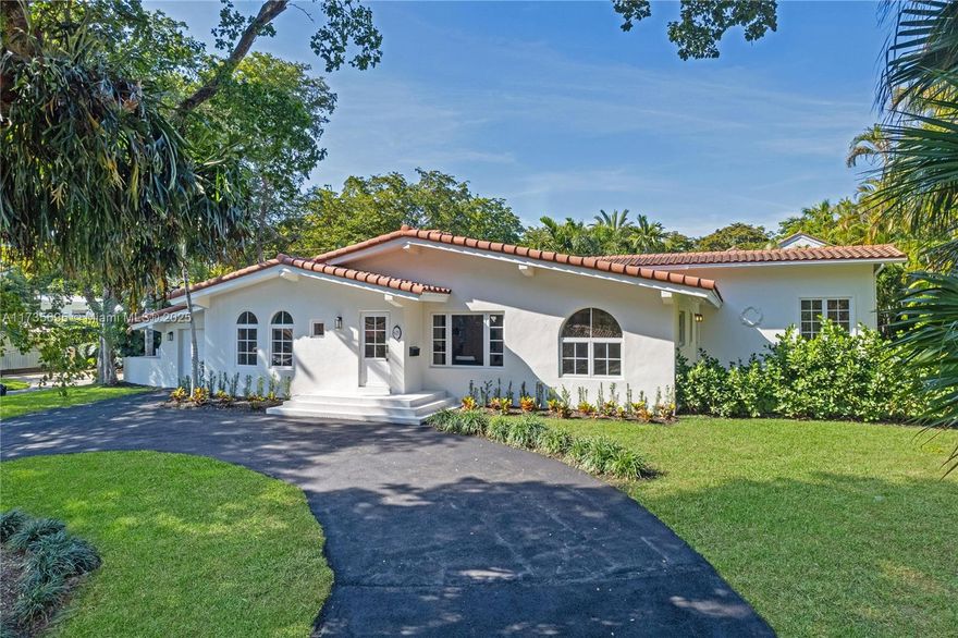 Stunning residence in one of Coral Gables' most sought-after neighborhoods on Jeronimo Drive. This exceptional home features four bedrooms, three bathrooms, a dedicated office, and a large covered patio on an elevated 10,400-square-foot lot. Recently updated with new kitchens and bathrooms, it boasts impact windows and doors throughout. Enjoy a flawless layout with soaring 14-foot ceilings in the main living area and master suite, complemented by a gorgeous master suite and spacious walk-in closet. Additionally, the property has plans to build a pool, making it the perfect oasis.
