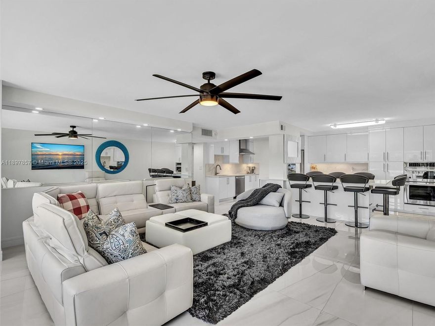 Experience coastal living at its finest in this beautifully updated 3Bed 2.5Bath condo offering ocean views from your private balcony—perfect for sunrise coffee. Features include a renovated open-concept kitchen with quartz countertops, stainless steel appliances, and ample pantry space. Upgrades also include tile flooring, impact windows/doors, walk-in primary closet, hot water heater and washer/dryer. Enjoy resort-style amenities including 24 hours security, fitness center, heated pool, BBQ, party & game rooms, EV charging stations, car wash area and covered garage parking. This Pet-friendly building is steps away from the Pompano Beach Pier, beach, dining, shopping, and events such as drone shows and fireworks.
