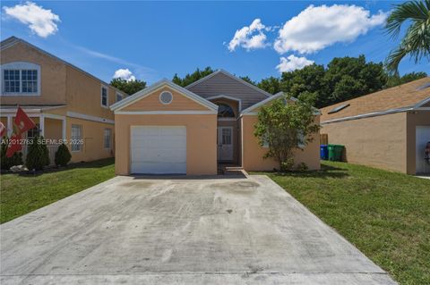 Photo of 9992 Periwinkle St, Miramar, FL 33025 (MLS # A12012763)
