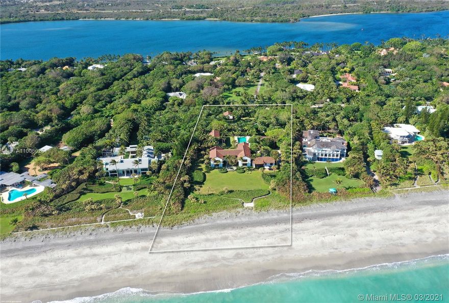 A magnificent Spanish Colonial style estate that has it all! Designed by renowned architect, Alan Wanzenberg, this home boast 265 feet of oceanfront on a lush 3.3 acre site. Built of the highest quality in 2007, the property boasts a 5-bedroom main house in addition to a 3-bedroom guest house. Other notable features include a full gym with sauna and steam rooms, caretaker apartment above storage garage, pool, Jacuzzi, and Har-Tru tennis court. Enjoy the serenity and privacy that the estate section of Jupiter Island has to offer.