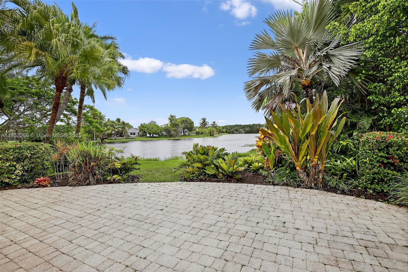 Wake up to postcard-perfect, long-lake views in this gorgeous light-filled home in Weston’s coveted The Lakes! Brand-new stainless-steel appliances, updated kitchen, recessed LED lighting, impact windows, newer AC, and a new water heater make this home move-in perfect and hurricane-safe. Soaring ceilings flooded with sunshine create a canvas for your personal style. Step outside to your lakefront patio, a perfect backdrop for effortless entertaining. Walk to resident amenities which include a sparking pool, children's adventure playground, soccer field and picnic grove. Minutes from Cliff Drysdale Tennis Center, Weston Regional Park, YMCA, and Midtown Athletic Club. Boasting A+ schools and quick I-75 access. This gorgeous home offers the ultimate Weston lifestyle for a growing family!