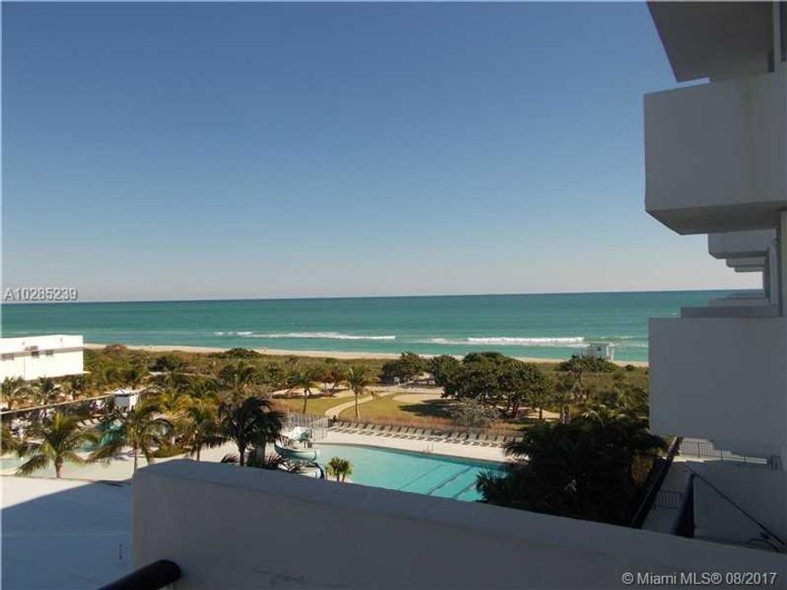 GORGEOUS OCEAN VIEWS!!! from this spacious corner unit- very private!  Rarely available, full load washer & dryer in the apartment.  Fabulous split plan Enjoy the ocean views from your balcony and master bedroom. Kitchen remodeled !! Walk to Bal Harbour shops, Publix, houses of worship, gym, pool, one assigned parking space. Sorry,No Pets as per building.