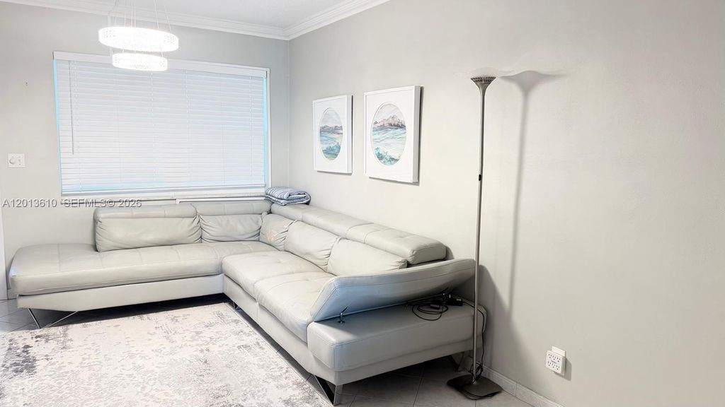 Photo of 580 Egret Dr #211, Hallandale Beach, FL 33009 (MLS # A12013610)