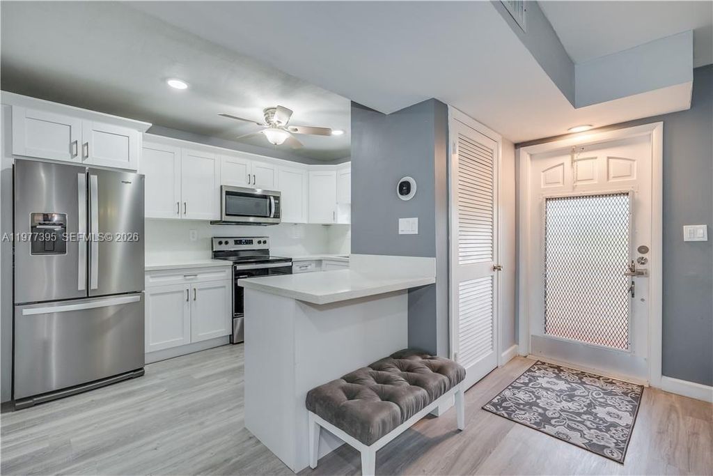 Photo of 681 S Hollybrook Dr #305, Pembroke Pines, FL 33025 (MLS # A11977395)