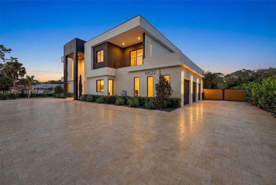 Welcome to this stunning new construction estate in the heart of Parkland! Boasting 6 bedrooms, 8 full bathrooms, and 1 half bath, plus an office/den. This luxurious residence offers an exceptional blend of elegance, functionality, and space. The home features boutique-style closets, a gourmet kitchen with quartz countertops, custom cabinetry, top-of-the-line appliances and 2 laundry rooms. Every bathroom is tastefully designed with high-end finishes. The expansive backyard is an entertainer’s dream, complete with a sparkling saline pool, jacuzzi, summer kitchen with barbecue area, and plenty of green space. Sitting on an oversized lot, there’s room to add a guest house, gym, or pickleball court. A rare opportunity to own a custom-built home!