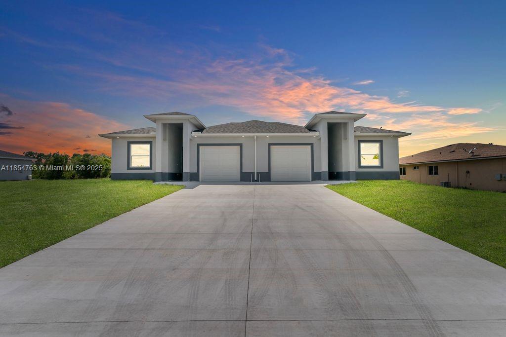 Discover the epitome of modern duplex living in this newly constructed investment masterpiece. Each meticulously crafted unit offers three bedrooms and two bathrooms, thoughtfully designed to maximize both comfort and functionality across an impressive living space. Step into a world where luxury meets practicality, as each residence showcases a stunning kitchen adorned with sophisticated Quartz countertops and premium stainless-steel appliances.-----> Refer to supplemental remarks for complete description!!!