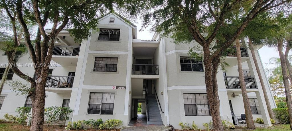 Photo of 11255 W Atlantic Blvd #307, Coral Springs, FL 33071 (MLS # A11971844)