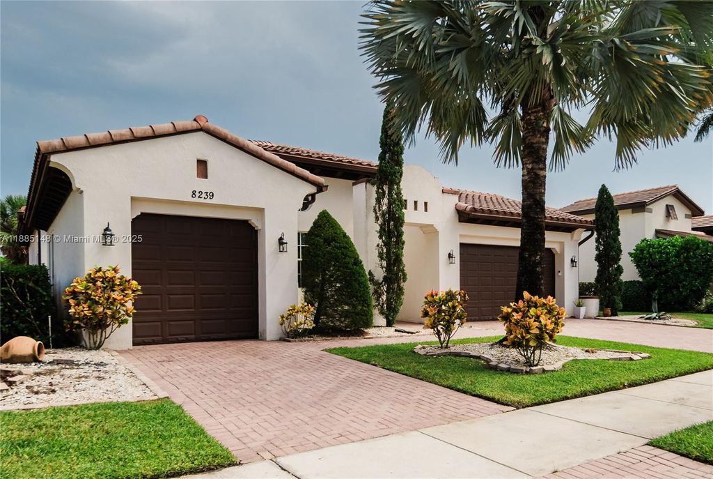 Photo of 8239 NW 124th Ter, Parkland, FL 33076 (MLS # A11885148)