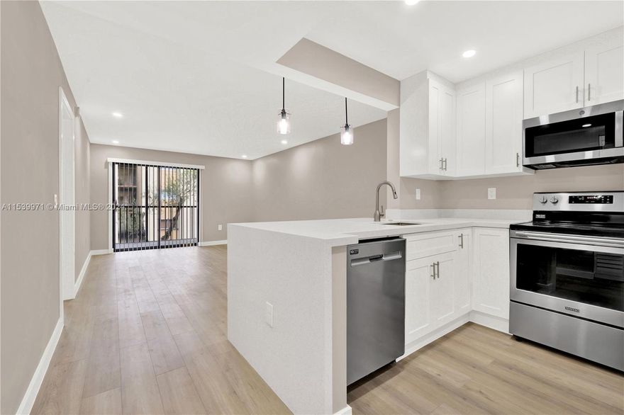 Gorgeously renovated 1 bed, 1 bath unit showcasing exquisite details throughout. Revel in the new quartz countertops, freshly painted walls, and sophisticated touches in the bathroom. Luxurious laminate flooring adds to the charm, while the convenience of a new washer and dryer within the unit enhances daily living. The eat-in kitchen features inviting countertops perfect for stools. Additionally, residents enjoy access to community amenities including 2 sparkling pools and tennis courts. The unit accommodates a maximum of 2 people, with no pets allowed. Enjoy the convenience of 1 assigned parking spot and guest parking. Renters insurance is mandatory for this upscale rental opportunity.